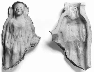 Mold of a Seated Frontal Female Figure