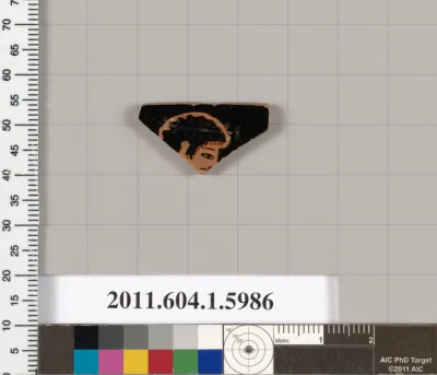 Terracotta rim fragment of a kylix (drinking cup)