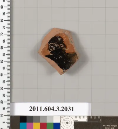 Terracotta fragment of a kylix (drinking cup)