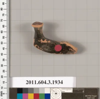 Terracotta fragment of a kylix (drinking cup)