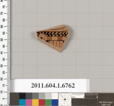 Terracotta fragment of a kylix (drinking cup)