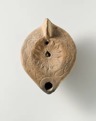 Terracotta oil lamp
