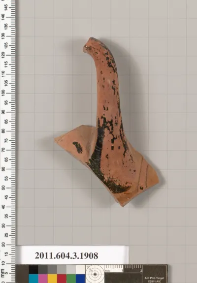 Terracotta fragment of a kylix (drinking cup)