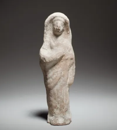 Standing female figurine