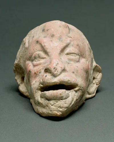 Two Miniature Theatrical Masks