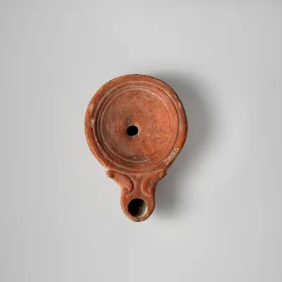 Terracotta oil lamp