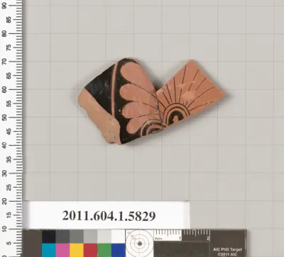 Terracotta fragment of a kylix: eye-cup  (drinking cup)