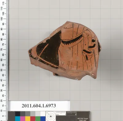 Terracotta fragment of a kylix (drinking cup)