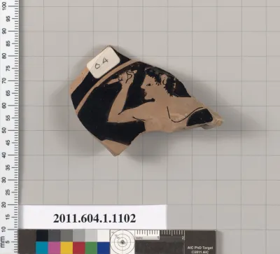 Terracotta fragment of a kylix (drinking cup)