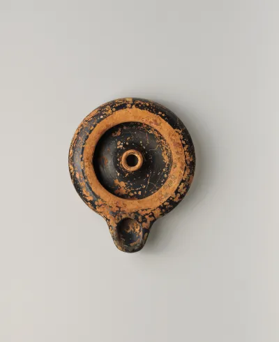 Terracotta oil lamp