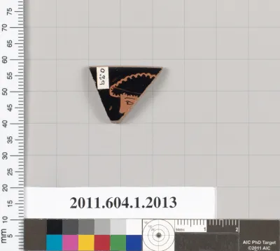 Terracotta rim fragment of a kylix (drinking cup)