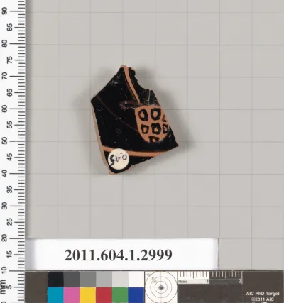 Terracotta fragment of a kylix (drinking cup)