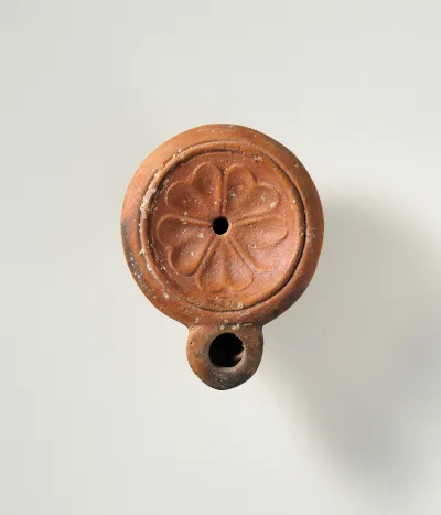 Terracotta oil lamp