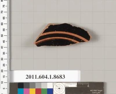 Terracotta fragment of a stemless kylix (drinking cup)