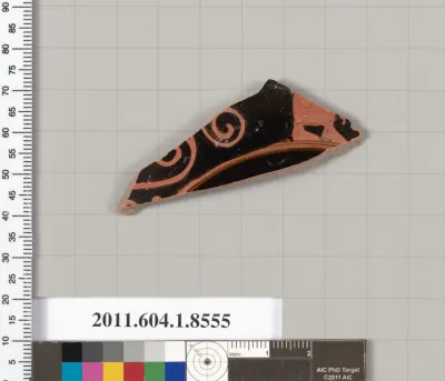 Terracotta fragment of a stemless kylix (drinking cup)