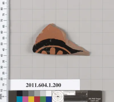 Terracotta fragment of a kylix (drinking cup)