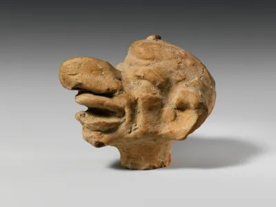 Terracotta grotesque head