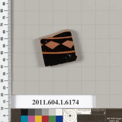 Terracotta fragment of a kylix (drinking cup)