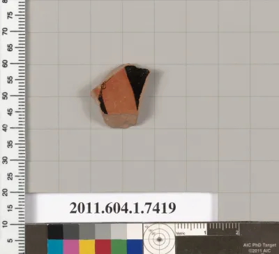 Terracotta fragment of a kylix (drinking cup)