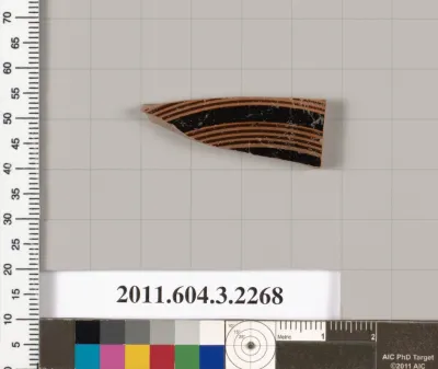 Terracotta fragment of a kylix (drinking cup)