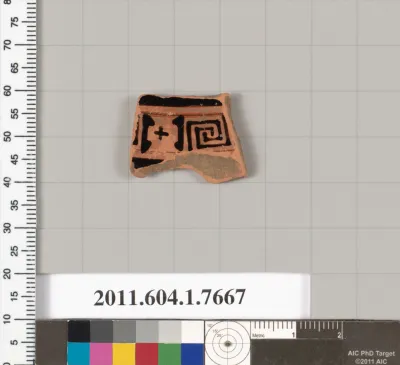 Terracotta fragment of a kylix (drinking cup)