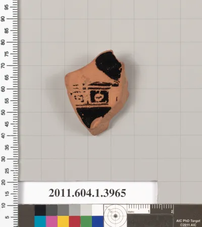 Terracotta fragment of a kylix (drinking cup)