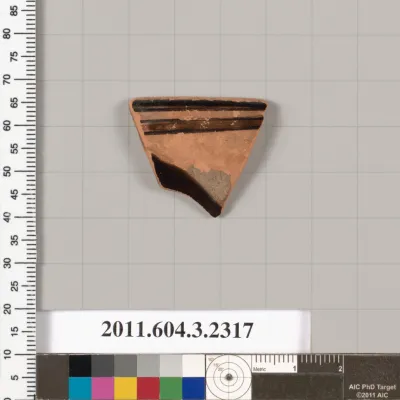Terracotta rim fragment of a kylix: eye-cup (drinking cup)