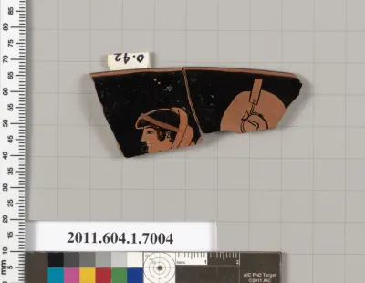 Terracotta rim fragment of a kylix (drinking cup)