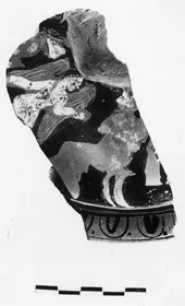 PYXIS LID, FRAGMENT (ATHENIAN, RED-FIGURE)
