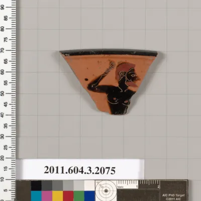 Terracotta rim fragment of a kylix (drinking cup)
