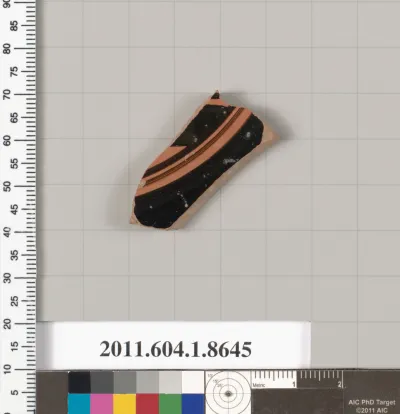 Terracotta fragment of a stemless kylix (drinking cup)