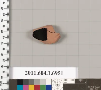 Terracotta fragment of a kylix (drinking cup)