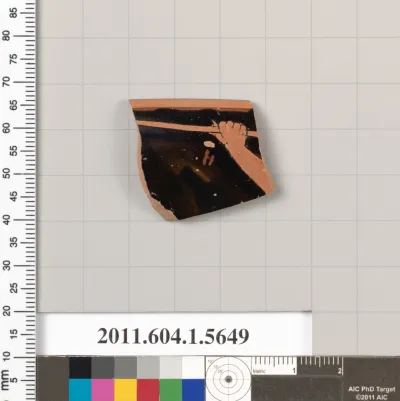 Terracotta rim fragment of a kylix (drinking cup)