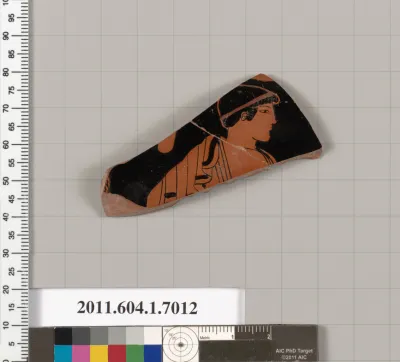 Terracotta fragment of a kylix (drinking cup)