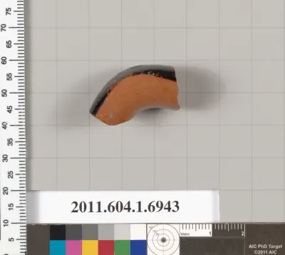 Terracotta fragment of a kylix (drinking cup)