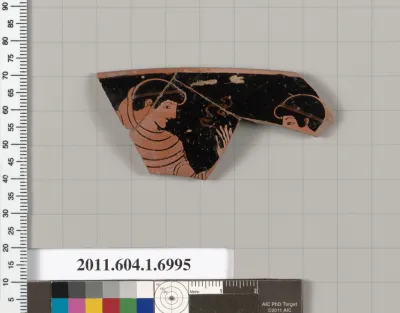 Terracotta rim fragment of a kylix (drinking cup)