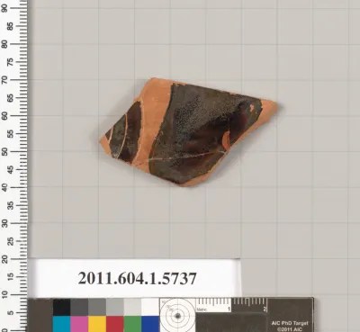 Terracotta fragment of a kylix: eye-cup  (drinking cup)