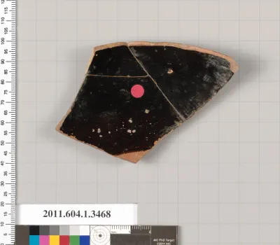 Terracotta fragment of a kylix (drinking cup)