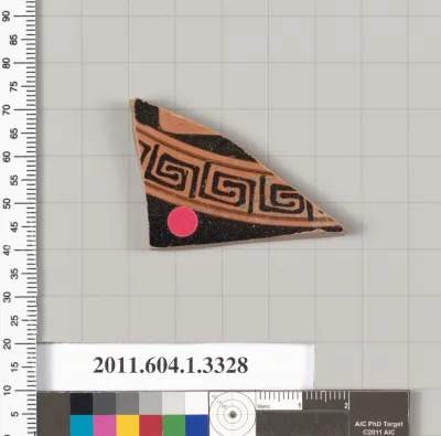 Terracotta fragment of a kylix (drinking cup)