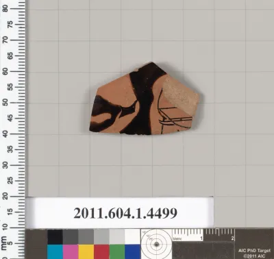 Terracotta fragment of a kylix (drinking cup)