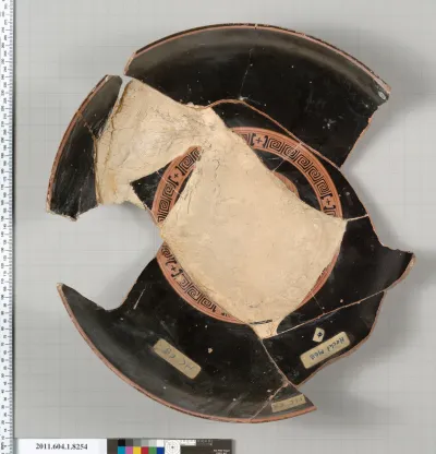Terracotta fragment of a kylix (drinking cup)