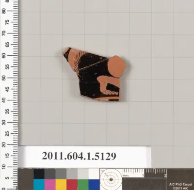 Terracotta fragment of a kylix (drinking cup)