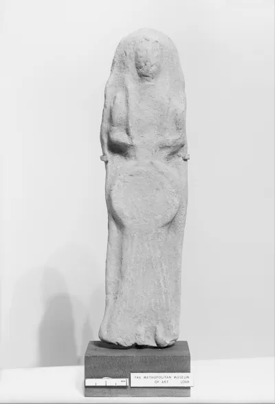 Terracotta plaque with a female figure holding a tympanum