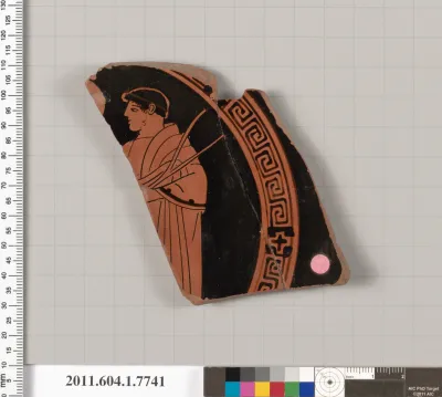 Terracotta fragment of a kylix (drinking cup)