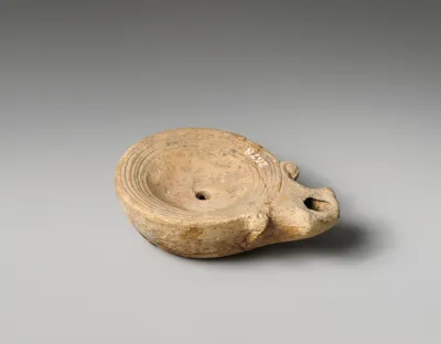 Terracotta oil lamp