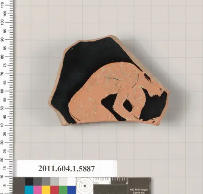 Terracotta fragment of a kylix (drinking cup)