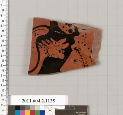 Terracotta fragment of a lekanis lid (covered dish)