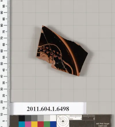 Terracotta fragment of a kylix (drinking cup)