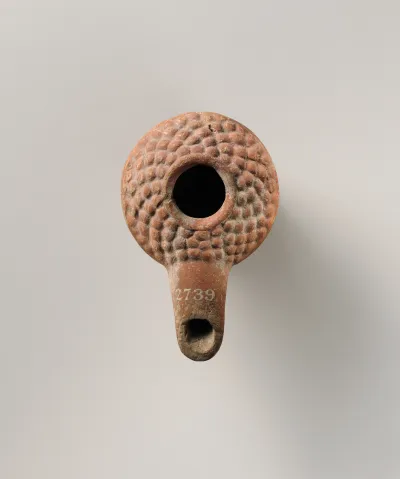 Terracotta oil lamp