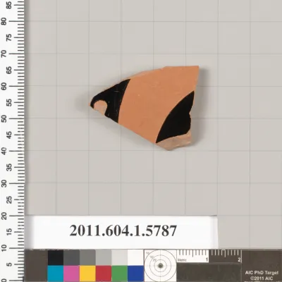 Terracotta fragment of a kylix: eye-cup  (drinking cup)